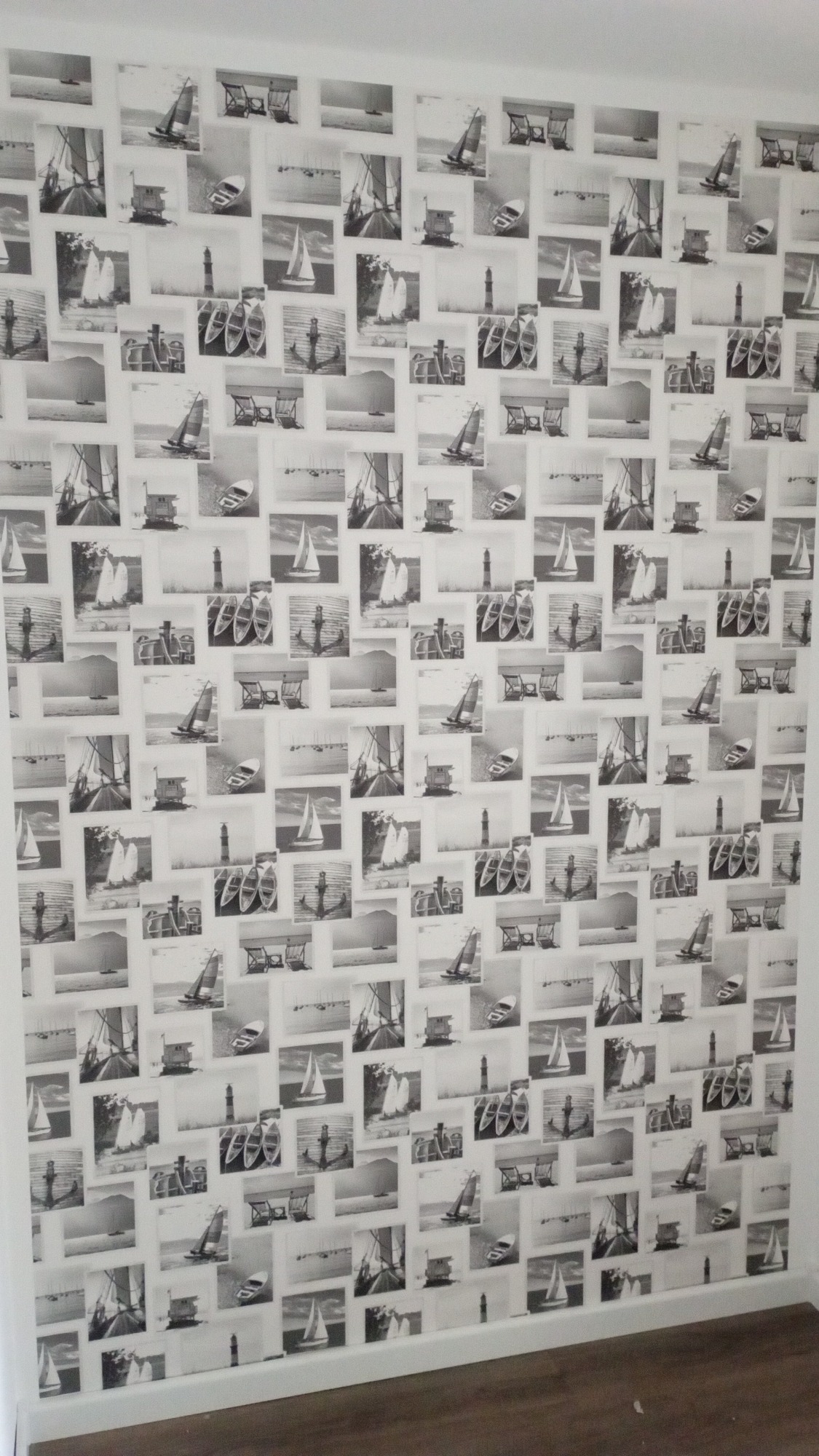 Tapete mit zahlreichen Schwarz-Weiß-Fotos